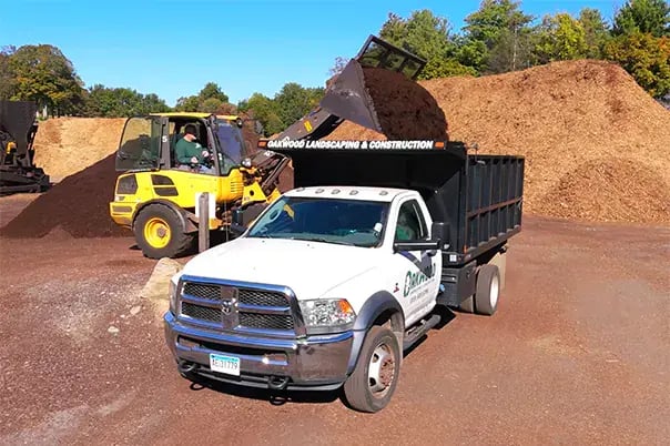 Loading truck with fresh mulch
